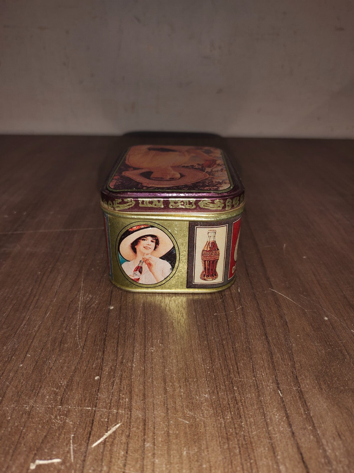 1988 Coca Cola Tin with Lid - Lady with Big Hat holding a Bottle of Coke 4"X2.5"