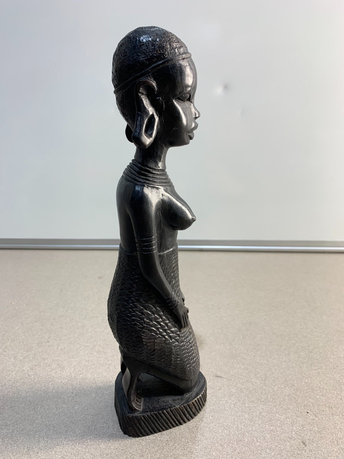 Vintage Kenyan hand carved sculpture of a kneeling African tribal woman