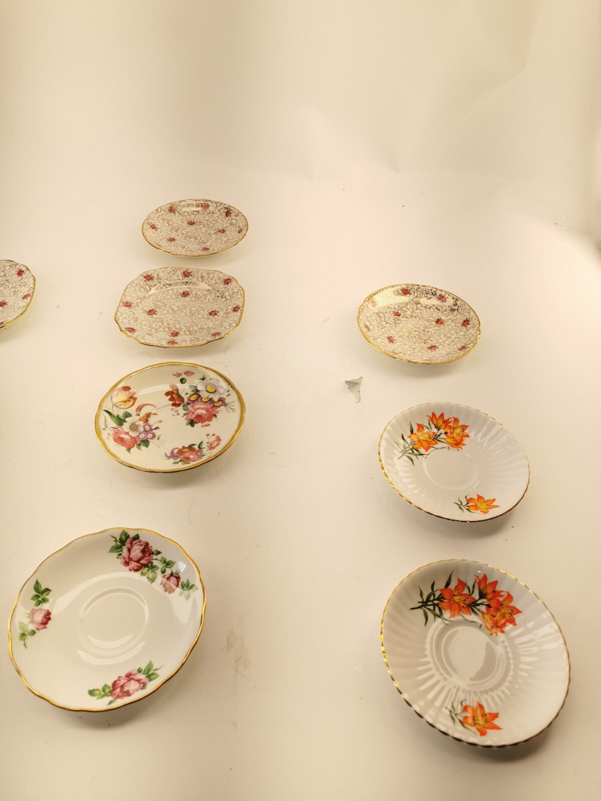 Assorted bone china set 4 cups and 10 saucers. Made in England/Japan/China