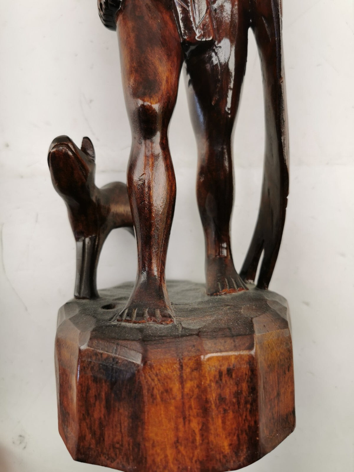 Carving of indigenous man, carved in noble woods.