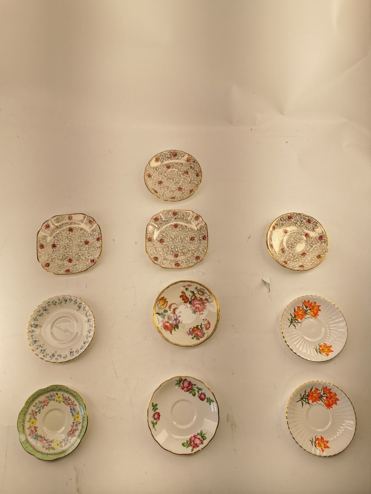 Assorted bone china set 4 cups and 10 saucers. Made in England/Japan/China