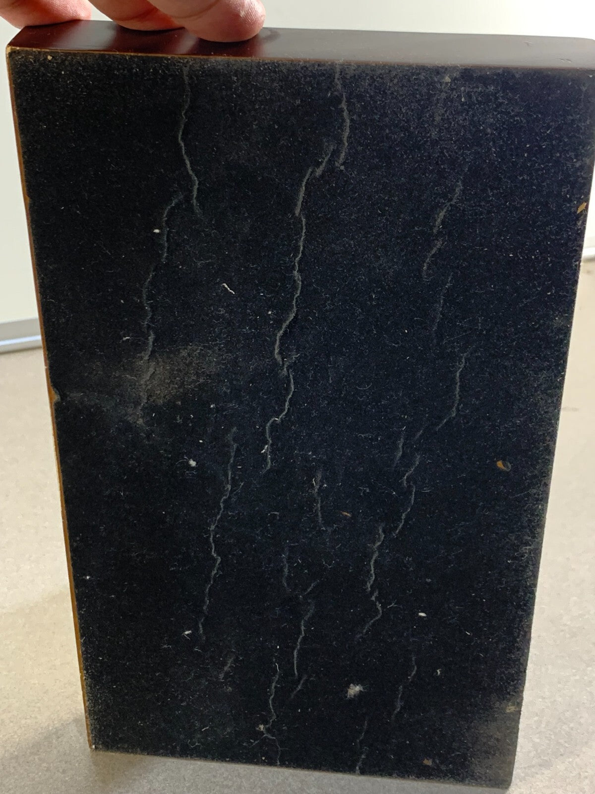 Bronze statue of Jesus washing the feet of Peter, at the last Supper.