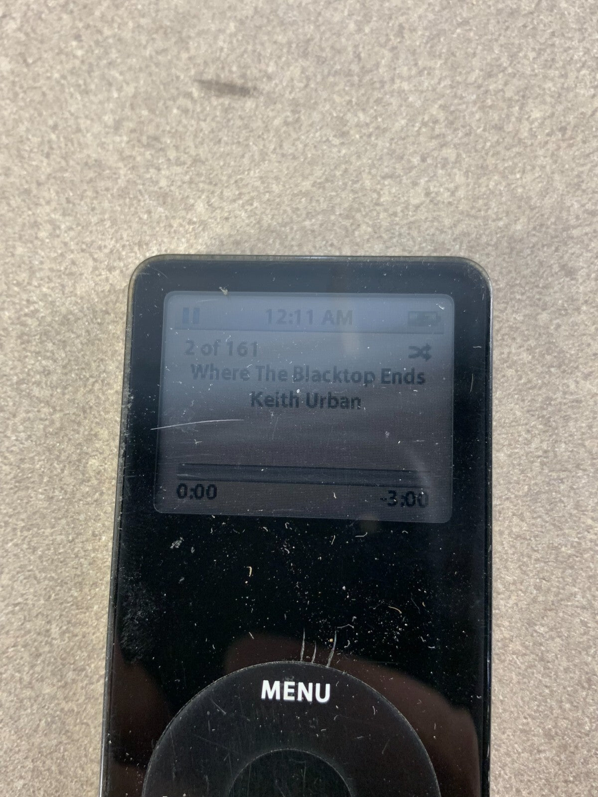 Apple iPod Model: A1137 Nano 1st Generation Black 1 GB Black With charging cord