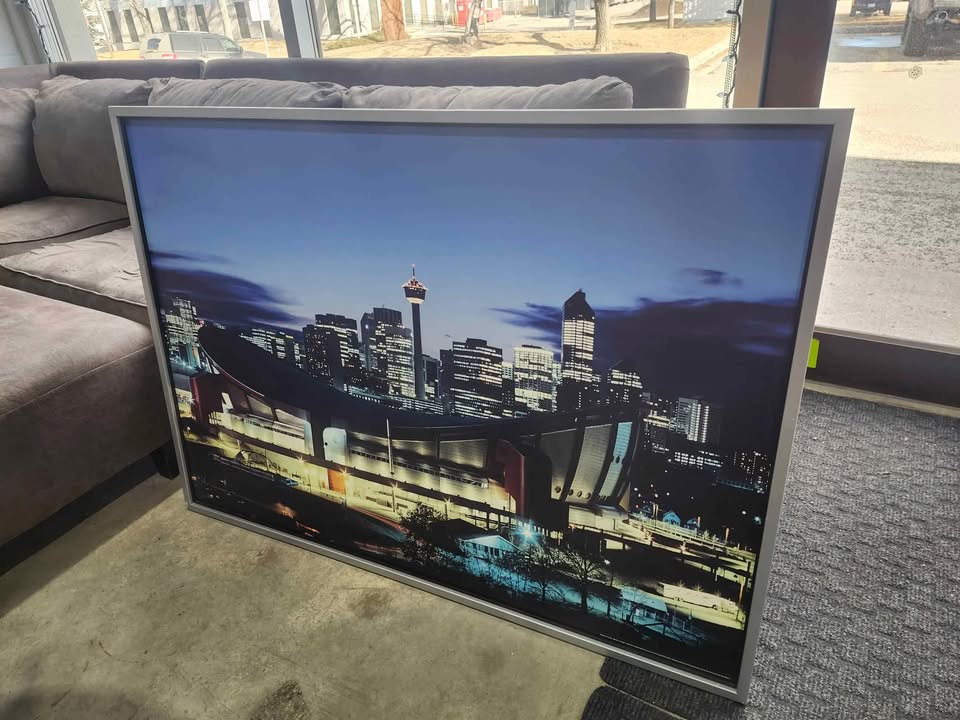 Ikea Wooden/Silver Framed Saddledome Picture 55x40"