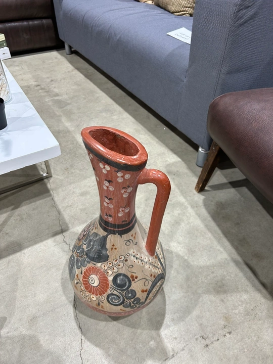 Hand-painted Talavera-style ceramic pitcher