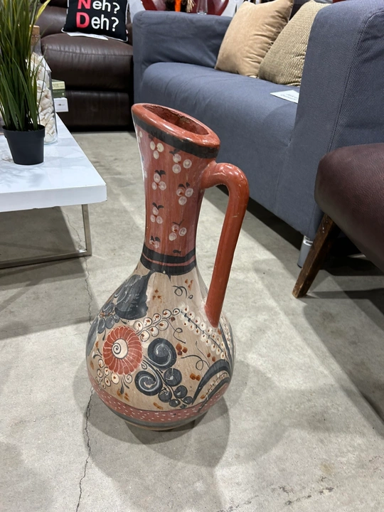 Hand-painted Talavera-style ceramic pitcher