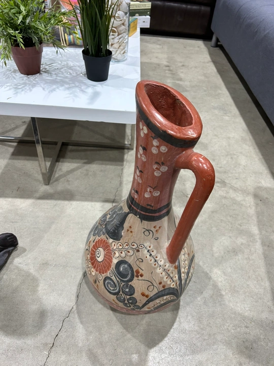 Hand-painted Talavera-style ceramic pitcher