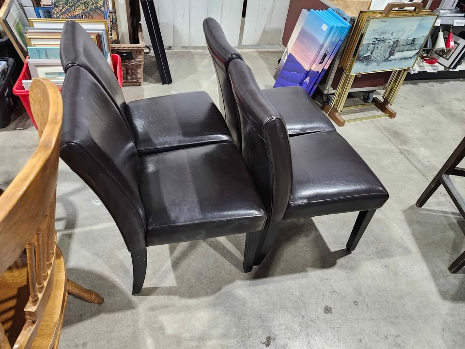 Four Brown Leather Dining Chairs