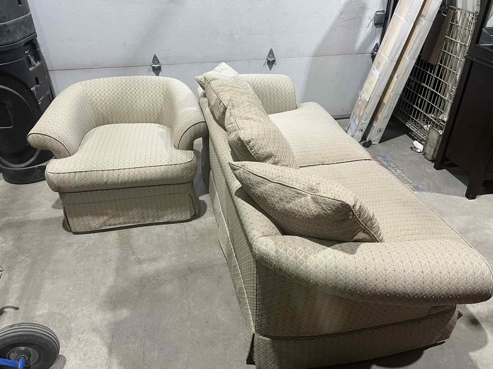 Sofa and armchair with throw pillows