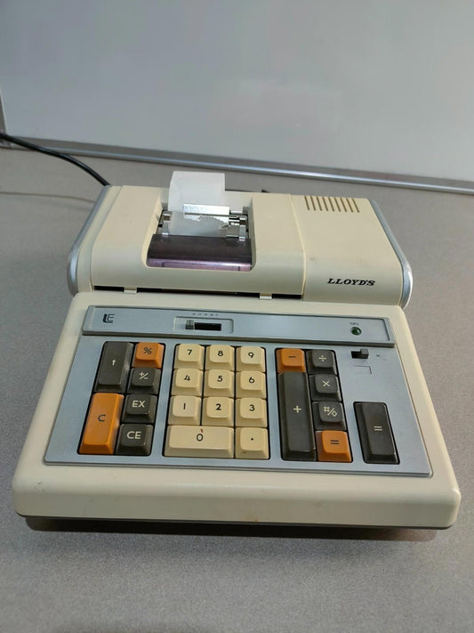 Lloyd's Electronics Accumatic Adding Machine model E104 Calculator