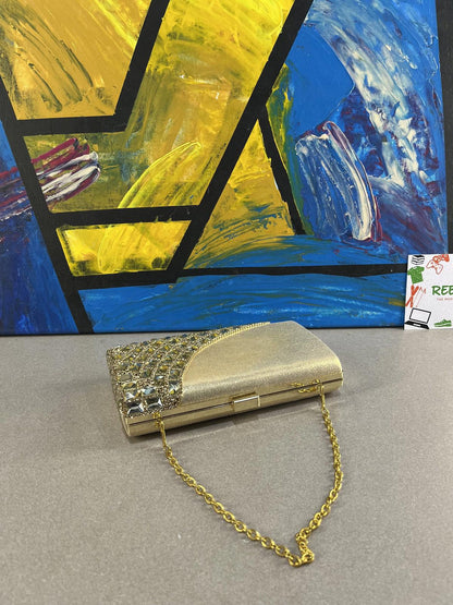 Elegant Gold Clutch with Chain Strap