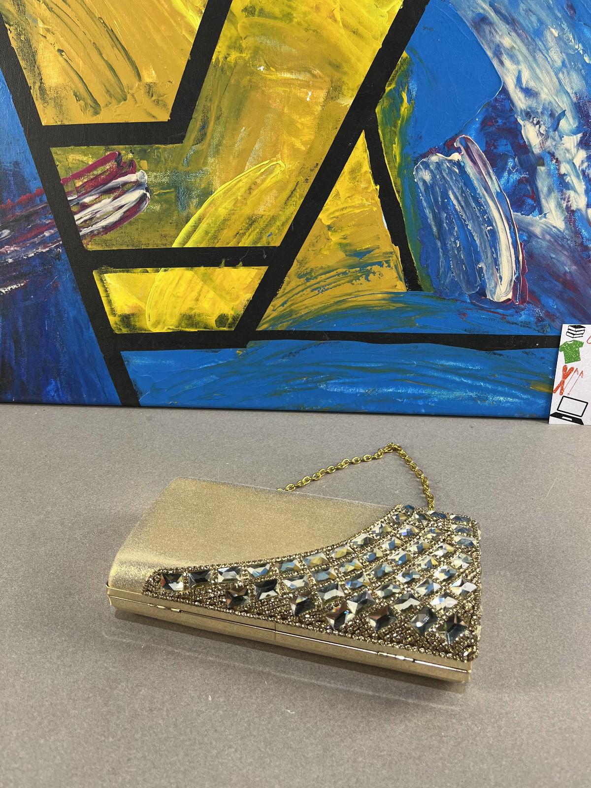 Elegant Gold Clutch with Chain Strap