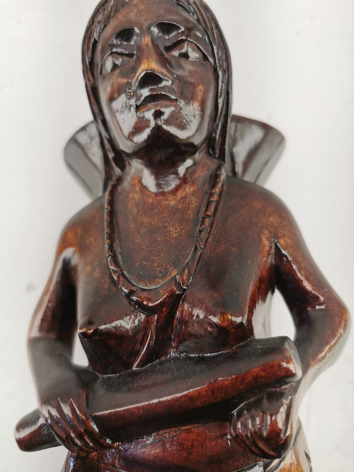 Carving of indigenous woman, carved in noble woods.