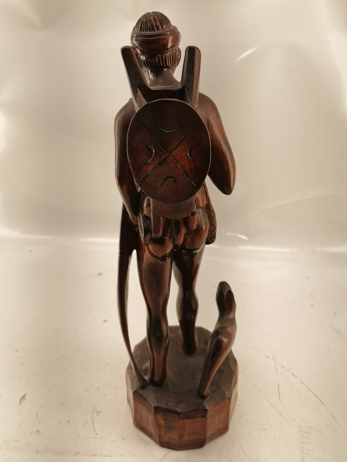 Carving of indigenous man, carved in noble woods.