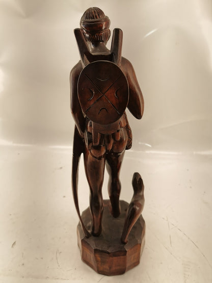 Carving of indigenous man, carved in noble woods.