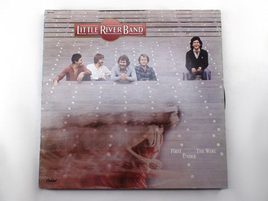 Timeless Elegance: Little River Band 'First Under the Wire' Vinyl in Good Condition