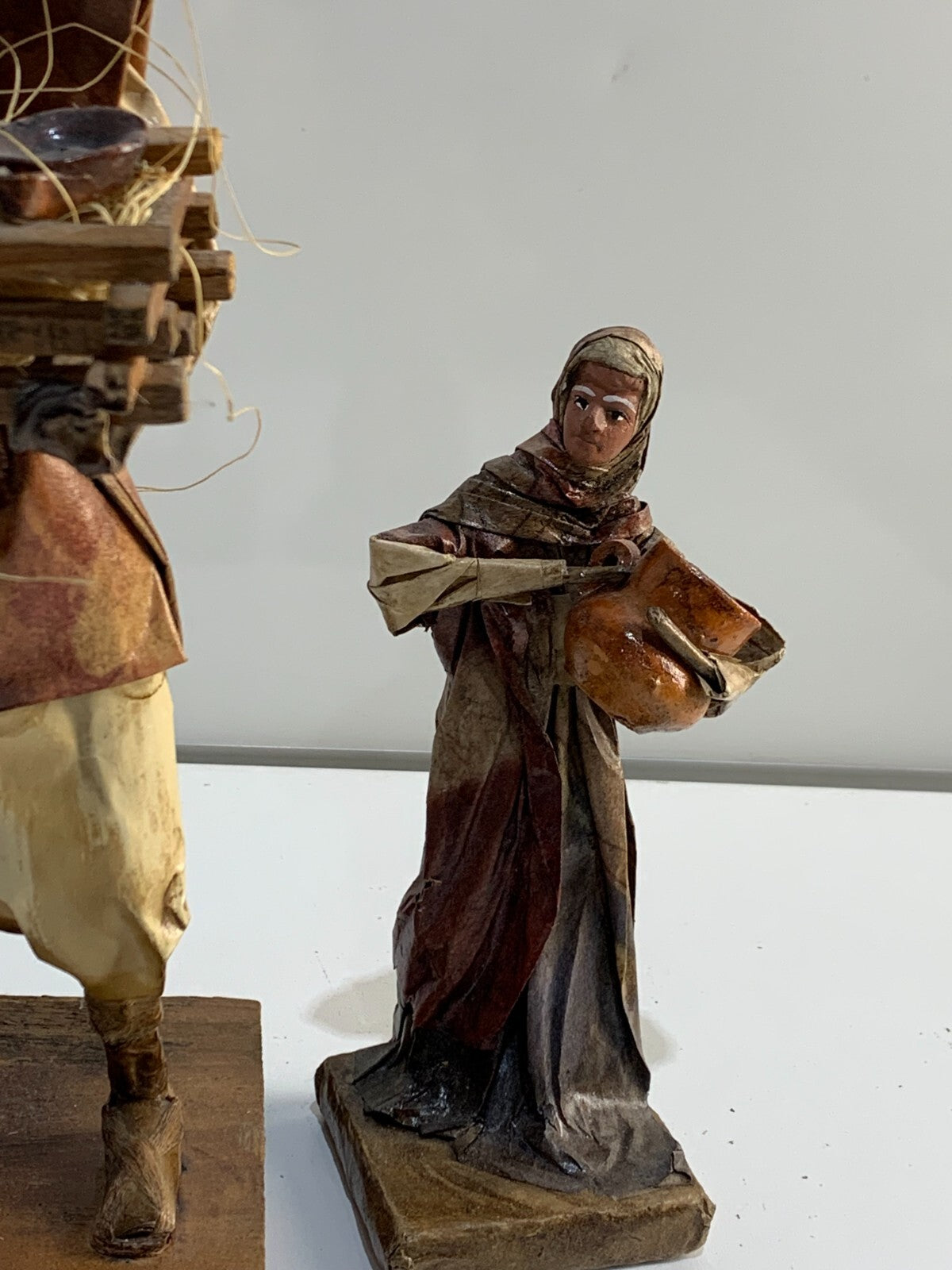 Vintage Mexican Folk Art Paper Mache Man & Woman Figures holding Pottery & Bowls