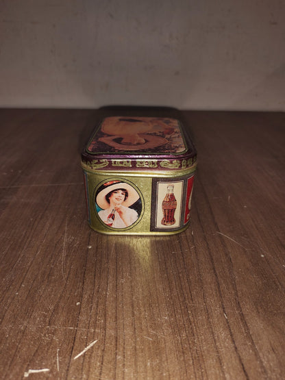 1988 Coca Cola Tin with Lid - Lady with Big Hat holding a Bottle of Coke 4"X2.5"