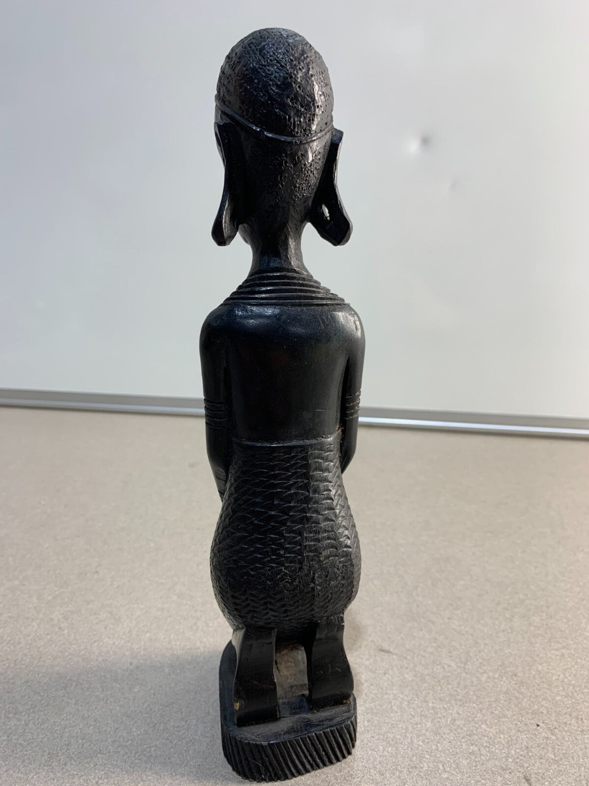 Vintage Kenyan hand carved sculpture of a kneeling African tribal woman