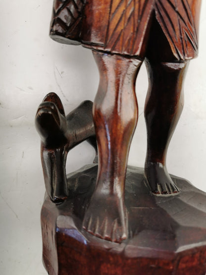 Carving of indigenous woman, carved in noble woods.