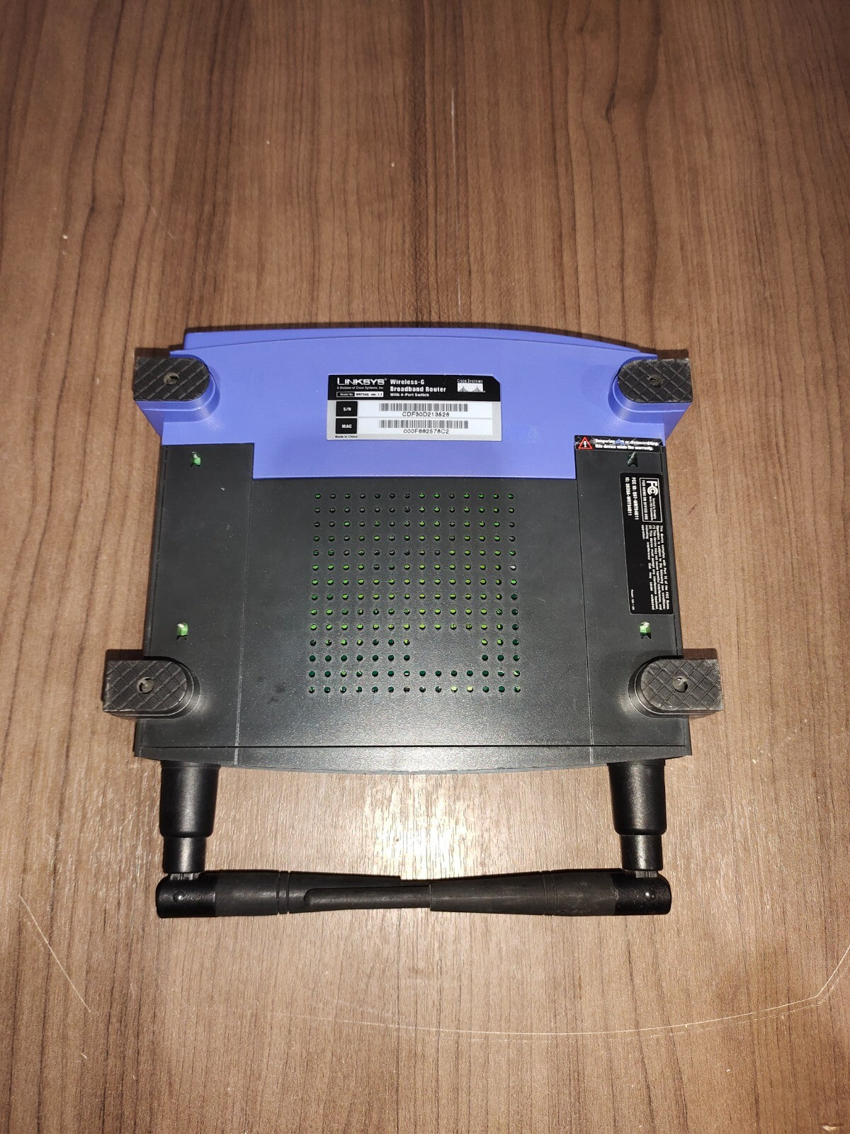 Linksys WRT54G-TM 54 Mbps 4-Port 10/100 Wireless G Router (WRT54GTM)