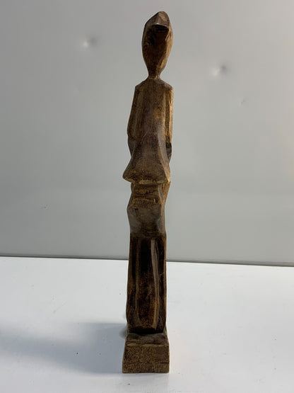 Vintage handmade Folk Art carving of a drummer.