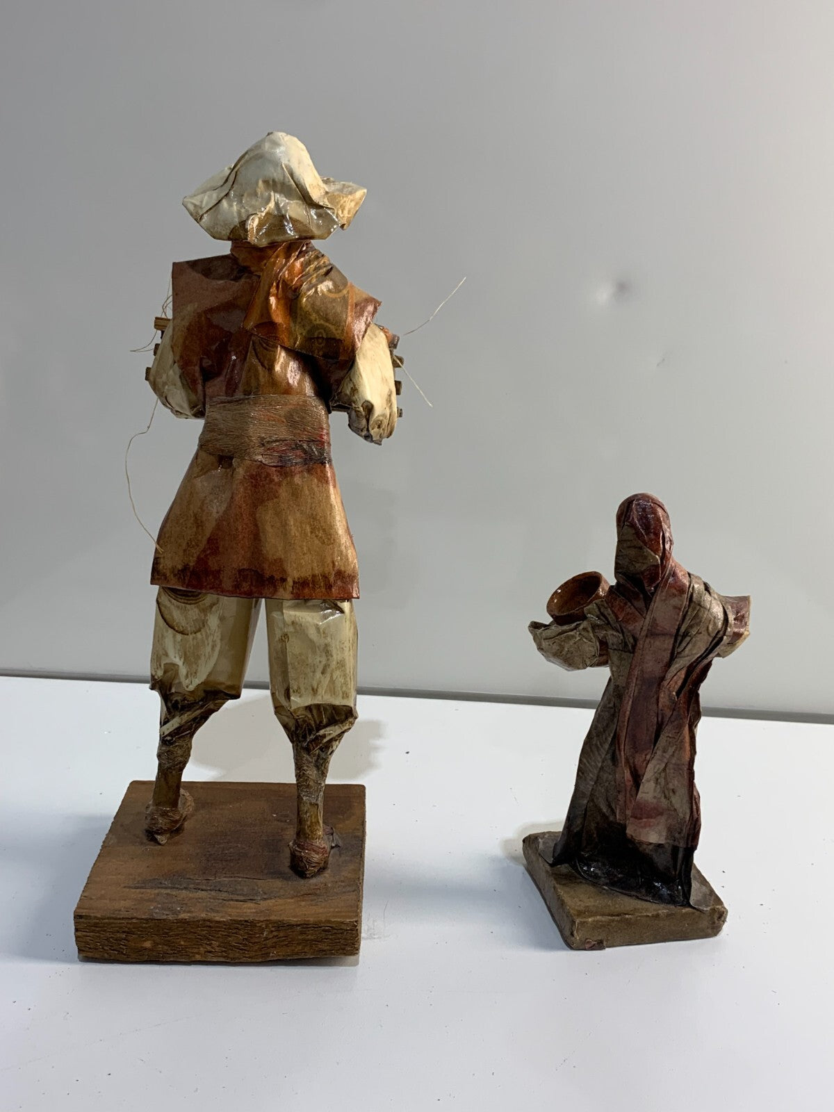 Vintage Mexican Folk Art Paper Mache Man & Woman Figures holding Pottery & Bowls