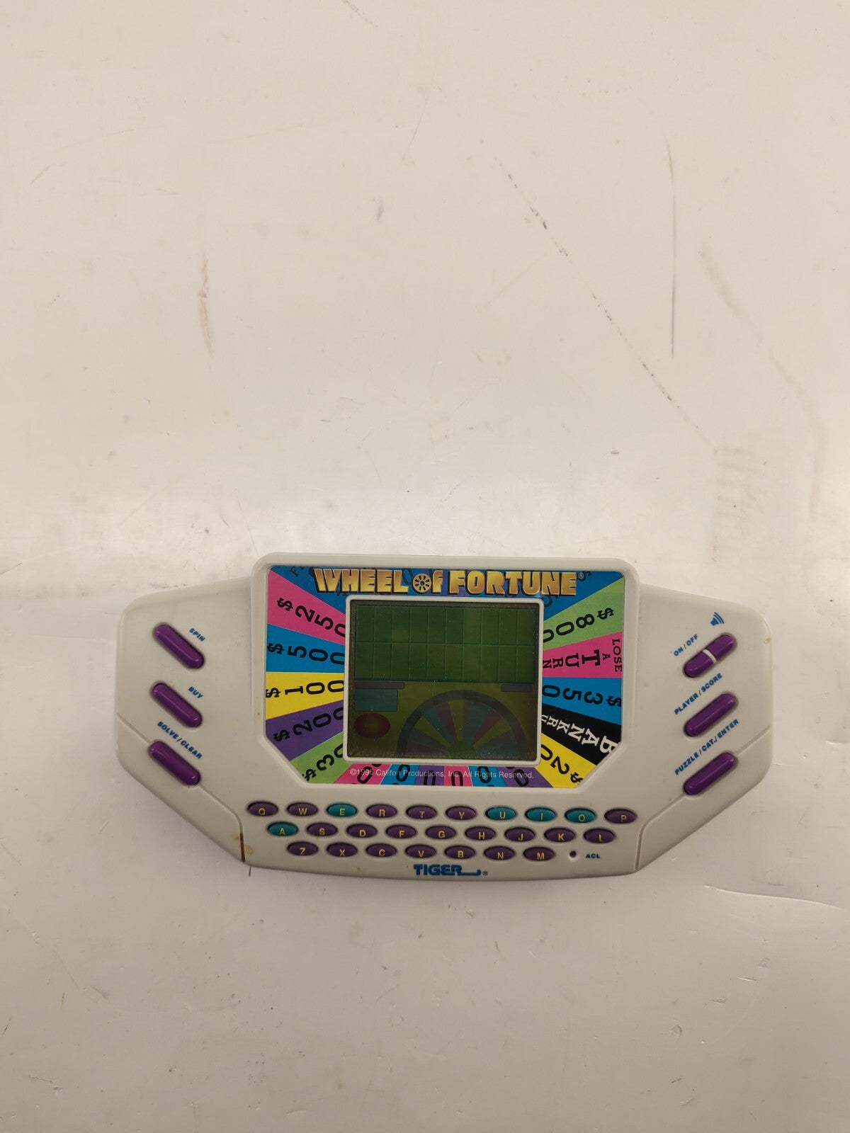 Vintage 1995 Wheel of Fortune Hand Held Game Tiger with Cartridge