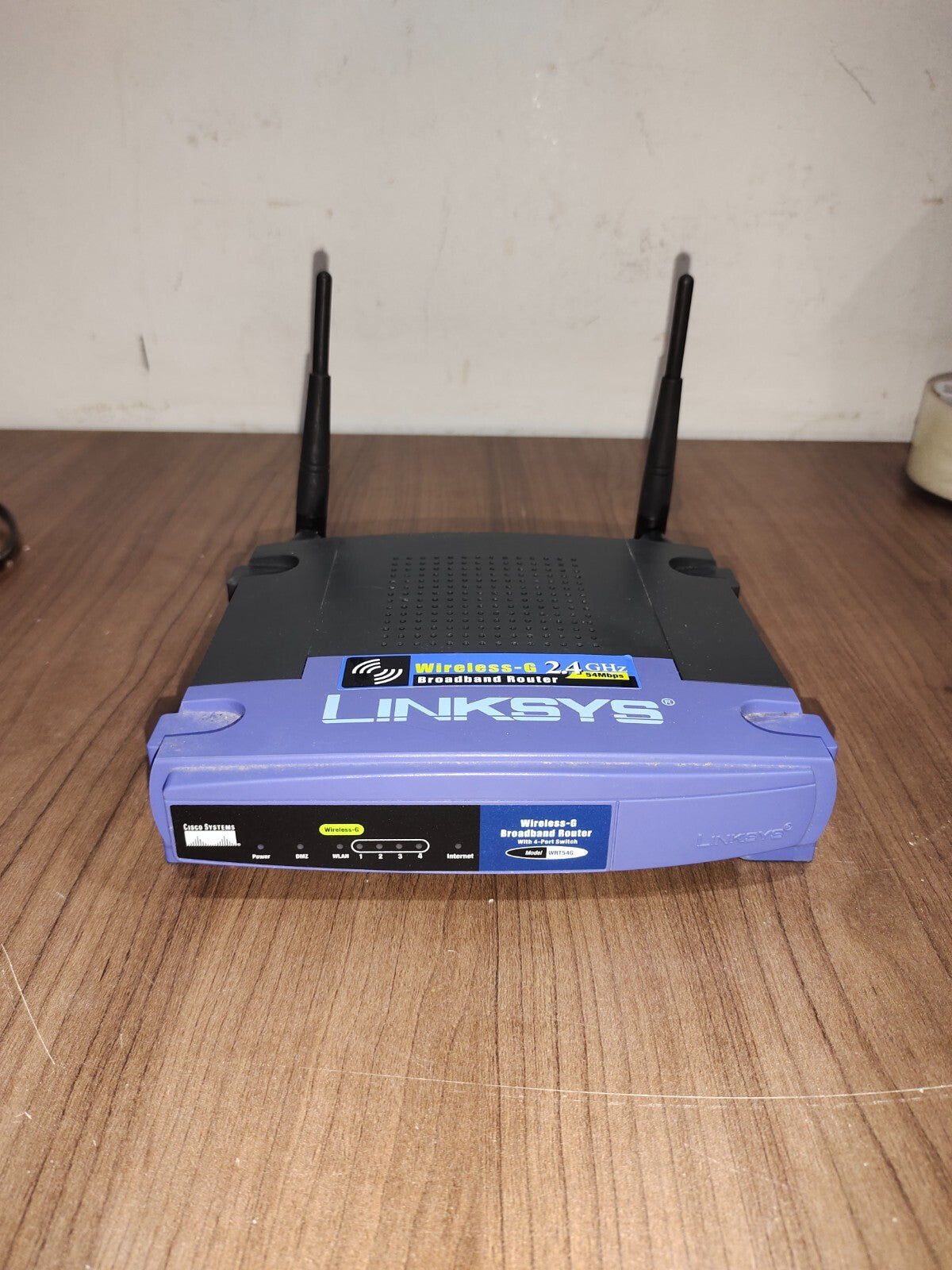 Linksys WRT54G-TM 54 Mbps 4-Port 10/100 Wireless G Router (WRT54GTM)