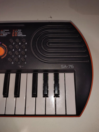 Casio SA-76 44-Key Mini Keyboard with 100 Tones 50 Rhythms Battery Powered E1
