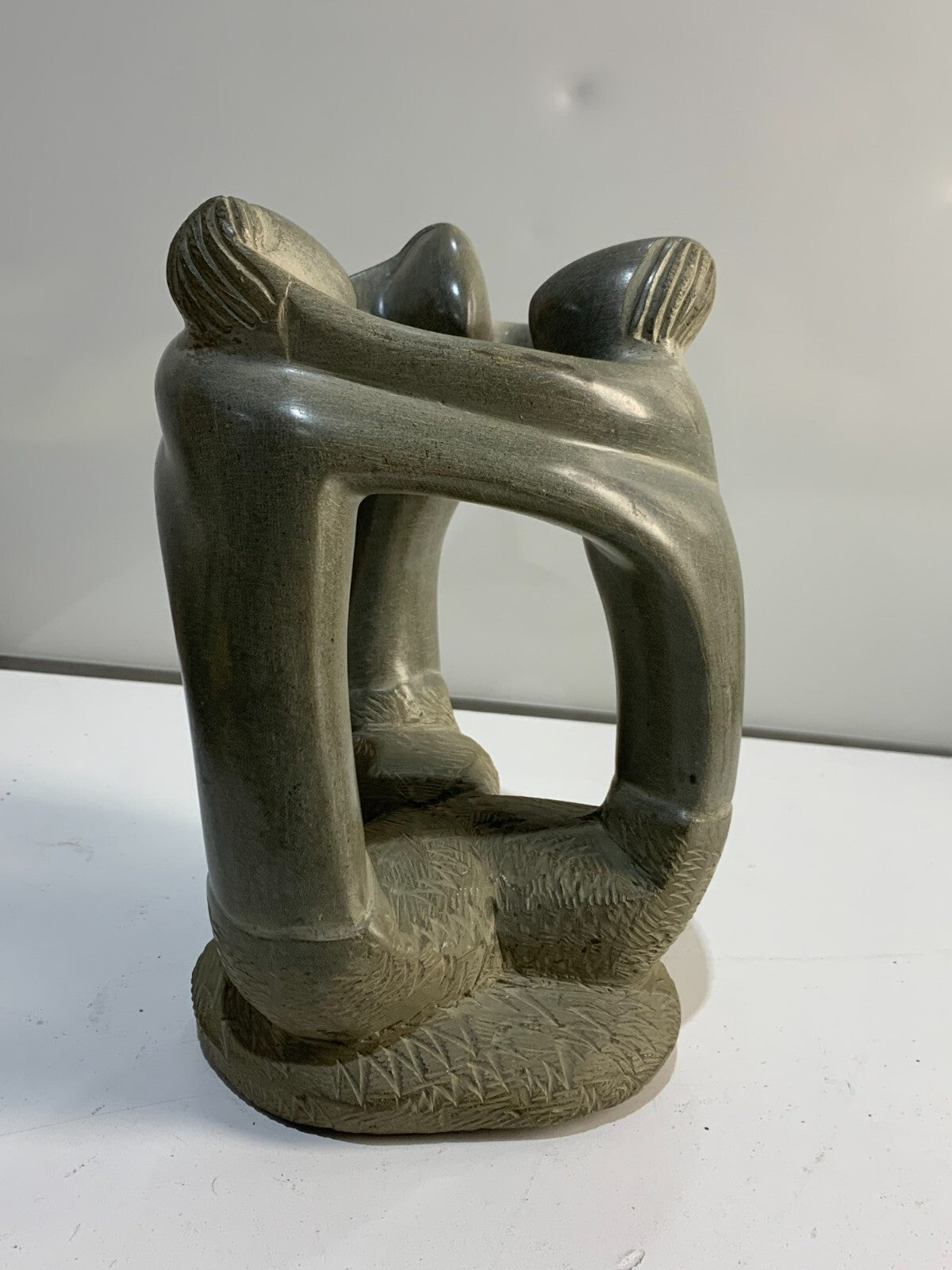 Vintage Hand Carved Green Soapstone 3 person Embracing Figurine