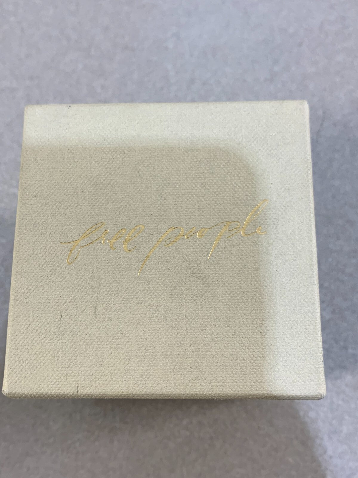 Free People French Juniper, Clove + Ginger Scented Candle.