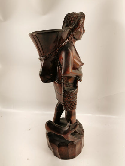 Carving of indigenous woman, carved in noble woods.