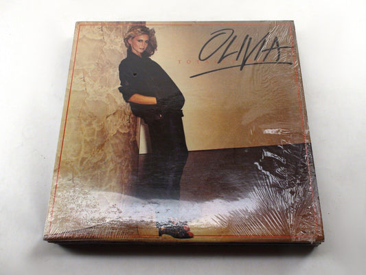 Sizzling Sounds: Olivia Newton-John 'Totally Hot' Vinyl in Good Condition