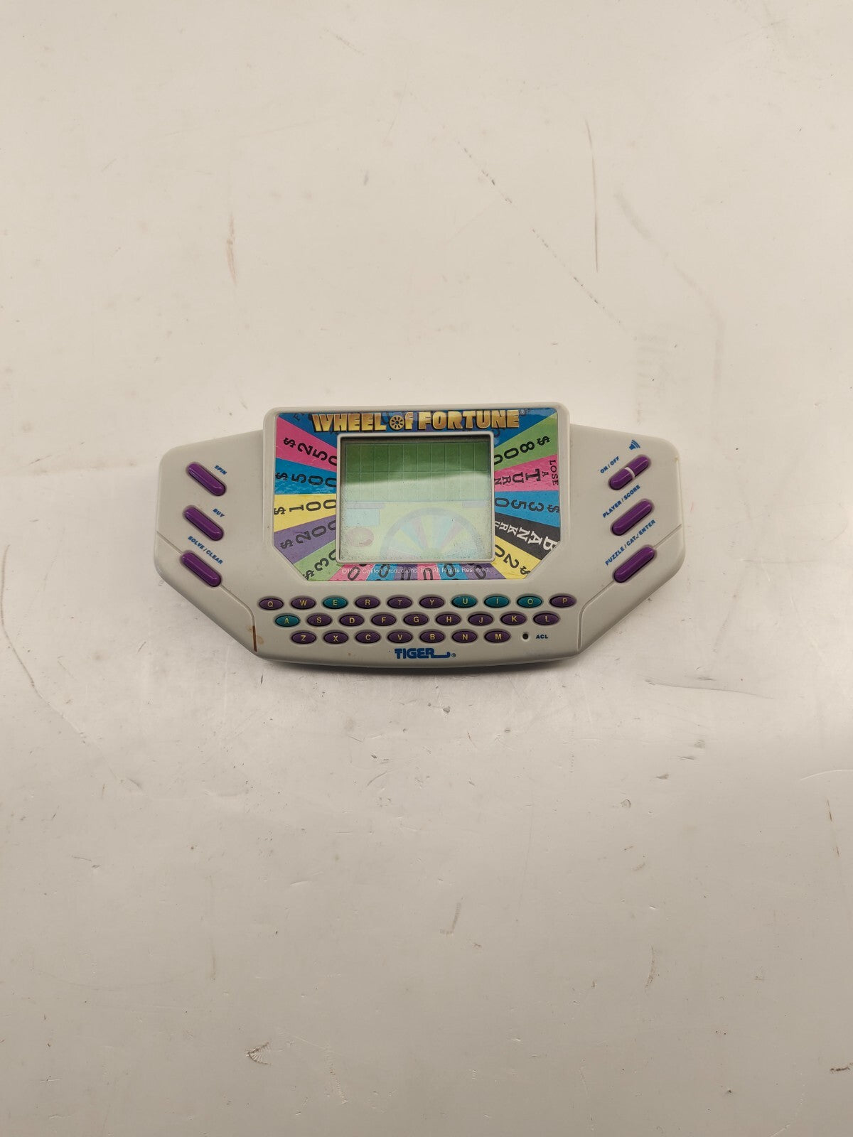 Vintage 1995 Wheel of Fortune Hand Held Game Tiger with Cartridge