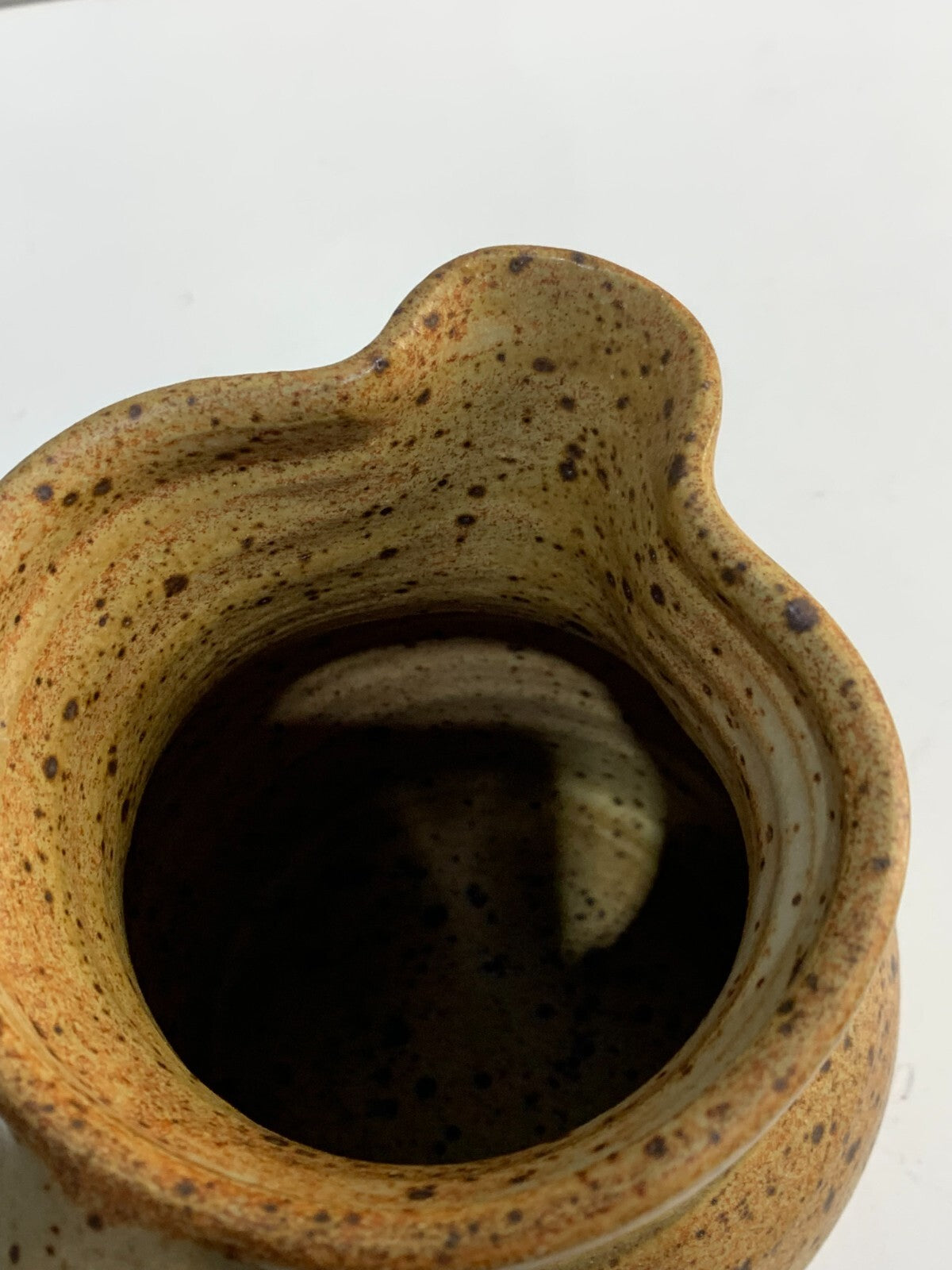 A vintage Handmade pottery jug