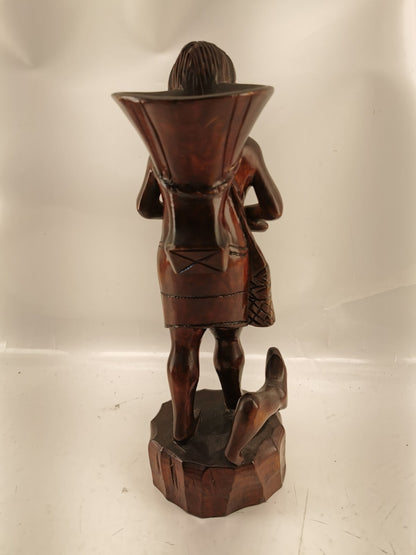 Carving of indigenous woman, carved in noble woods.