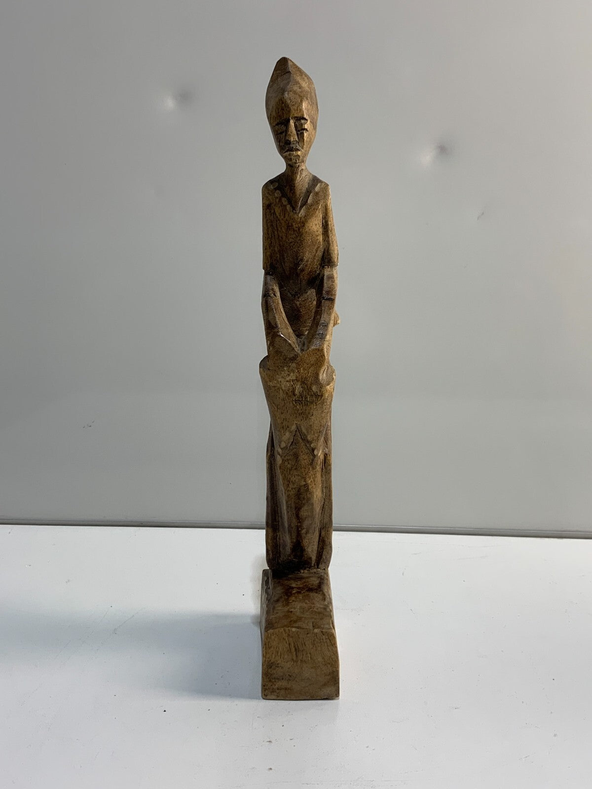Vintage handmade Folk Art carving of a drummer.