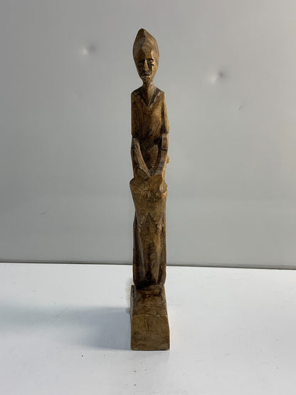 Vintage handmade Folk Art carving of a drummer.