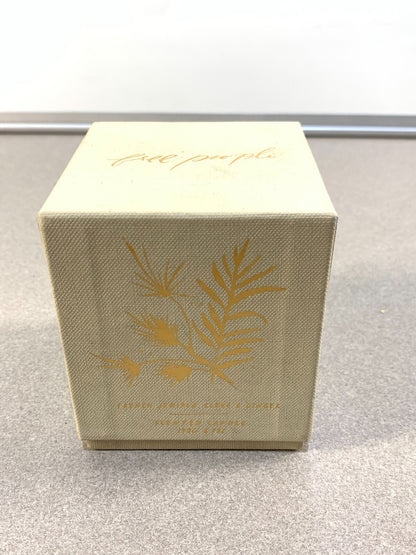 Free People French Juniper, Clove + Ginger Scented Candle.