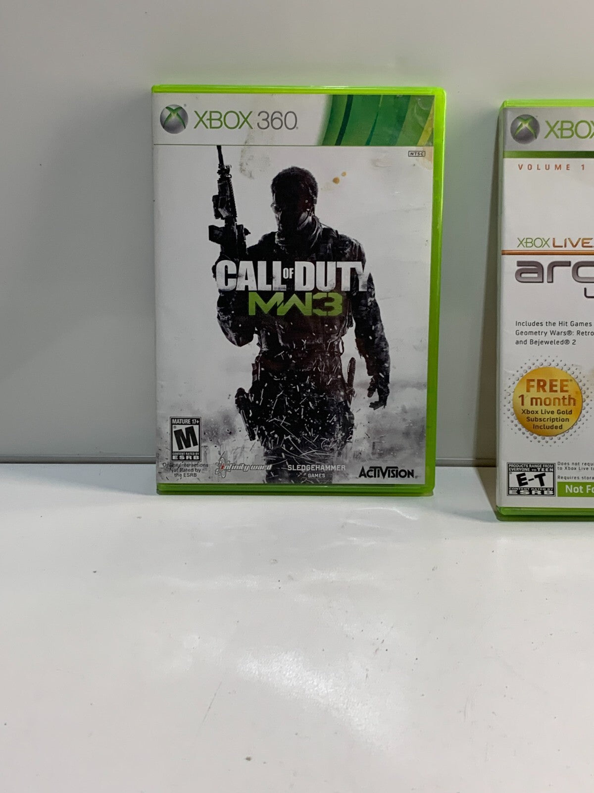 Lot of 2 Xbox 360 Games, Call of Duty: Modern Warfare 3 & Live Arcade Unplugged
