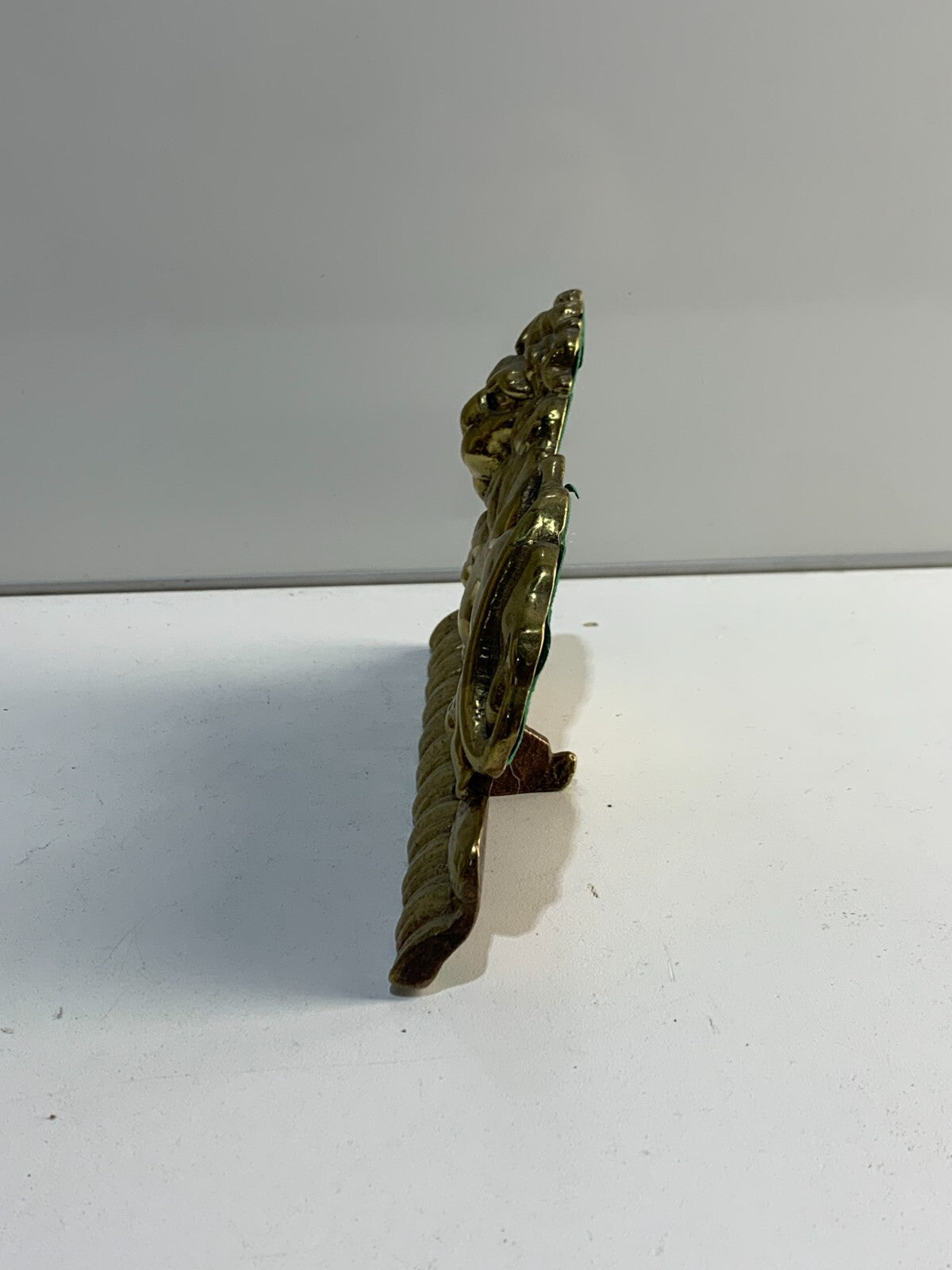 Antique Brass Mantelpiece Lion. Charming. Genuine