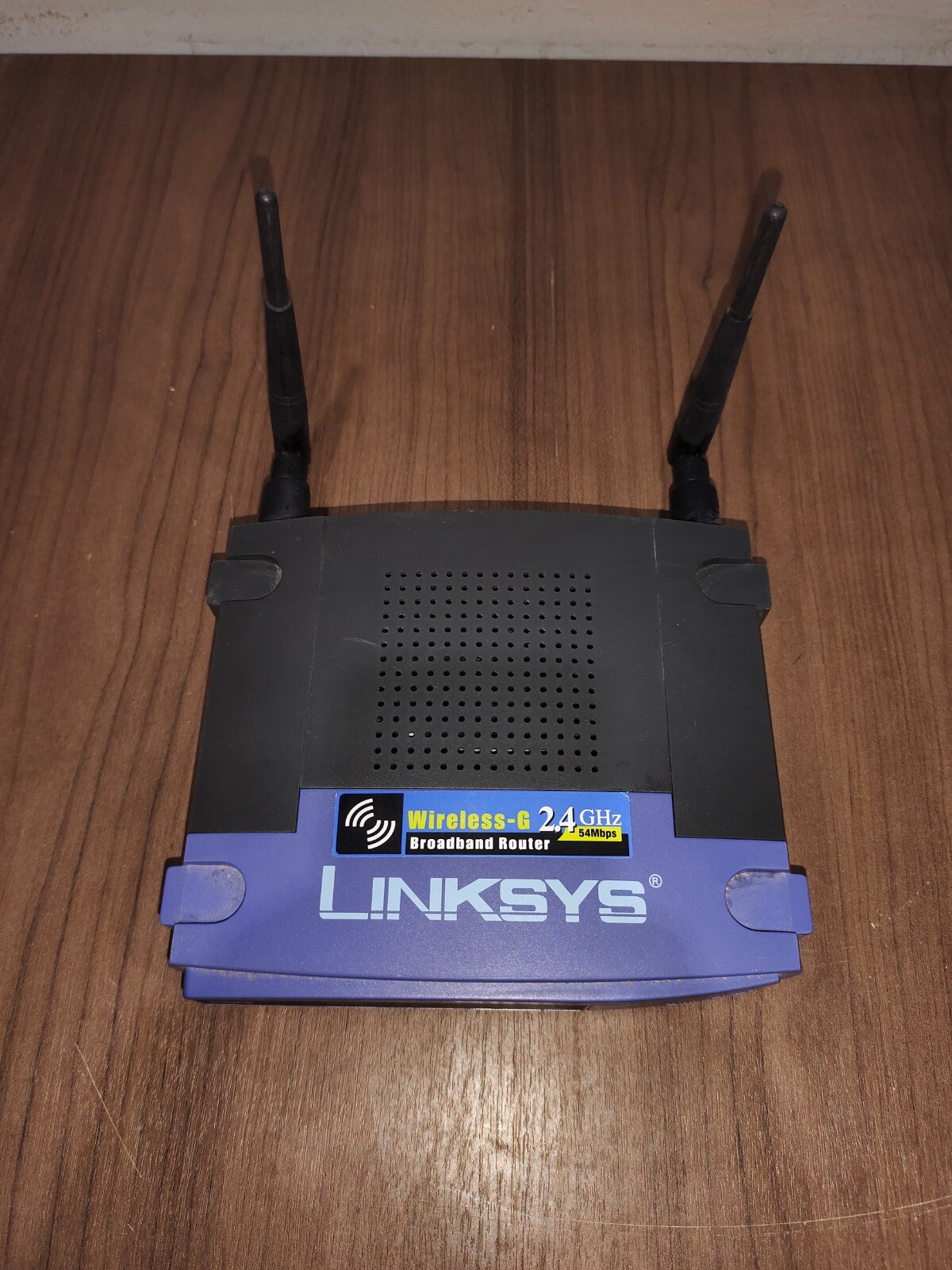 Linksys WRT54G-TM 54 Mbps 4-Port 10/100 Wireless G Router (WRT54GTM)