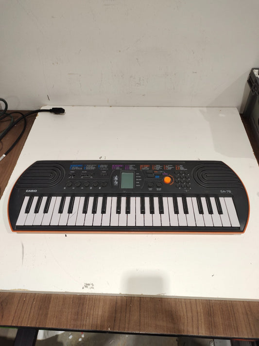 Casio SA-76 44-Key Mini Keyboard with 100 Tones 50 Rhythms Battery Powered E1