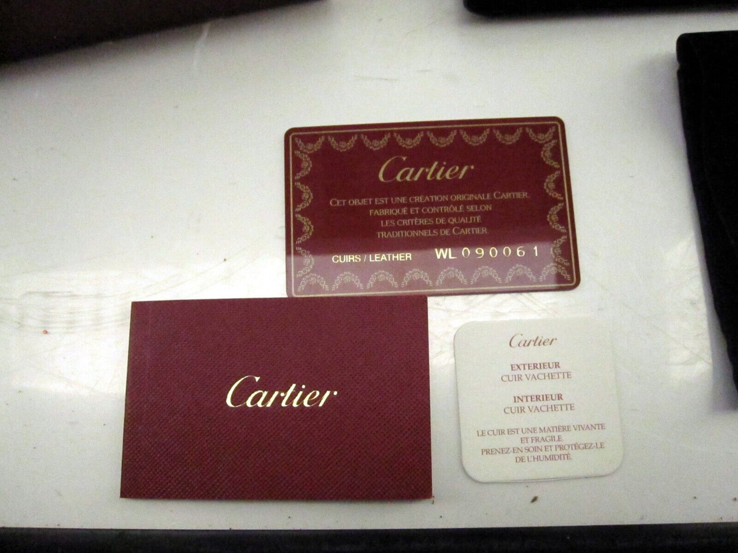 Authentic Cartier Black Leather Wallet - Certifications and Box Included