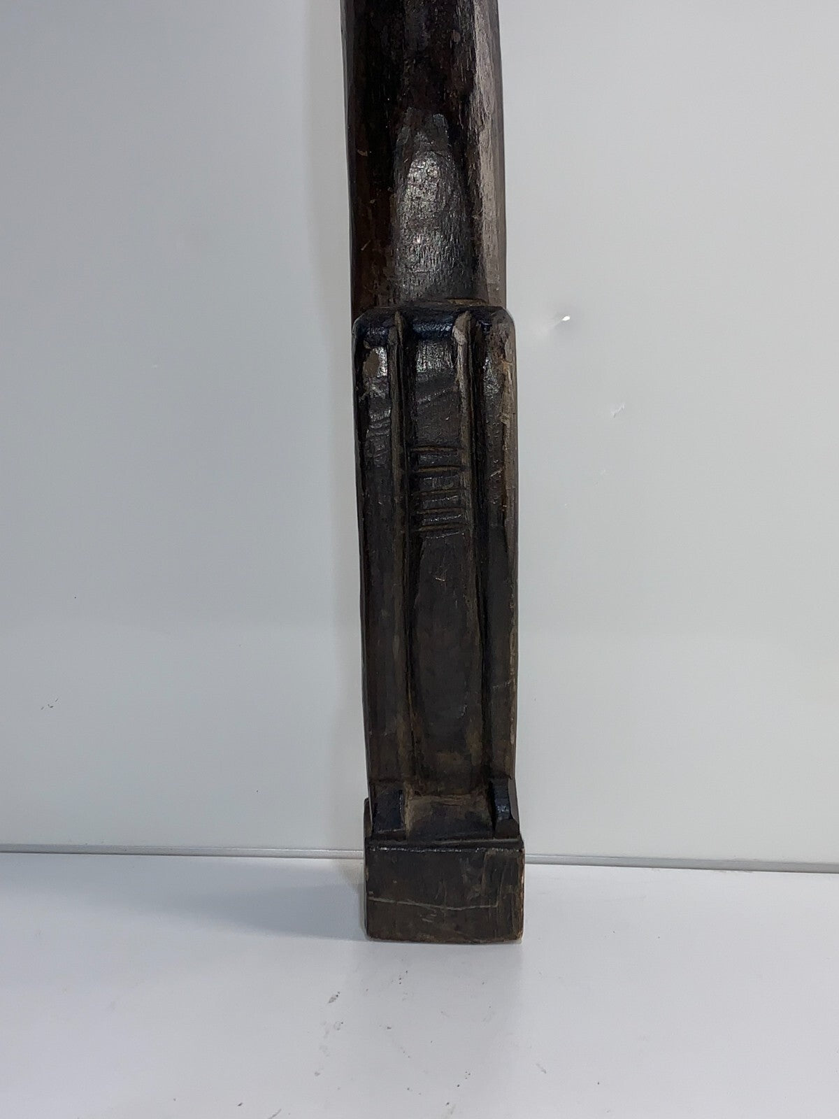 An African Carved Wood Seating Figure