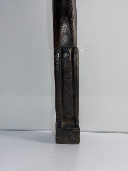 An African Carved Wood Seating Figure