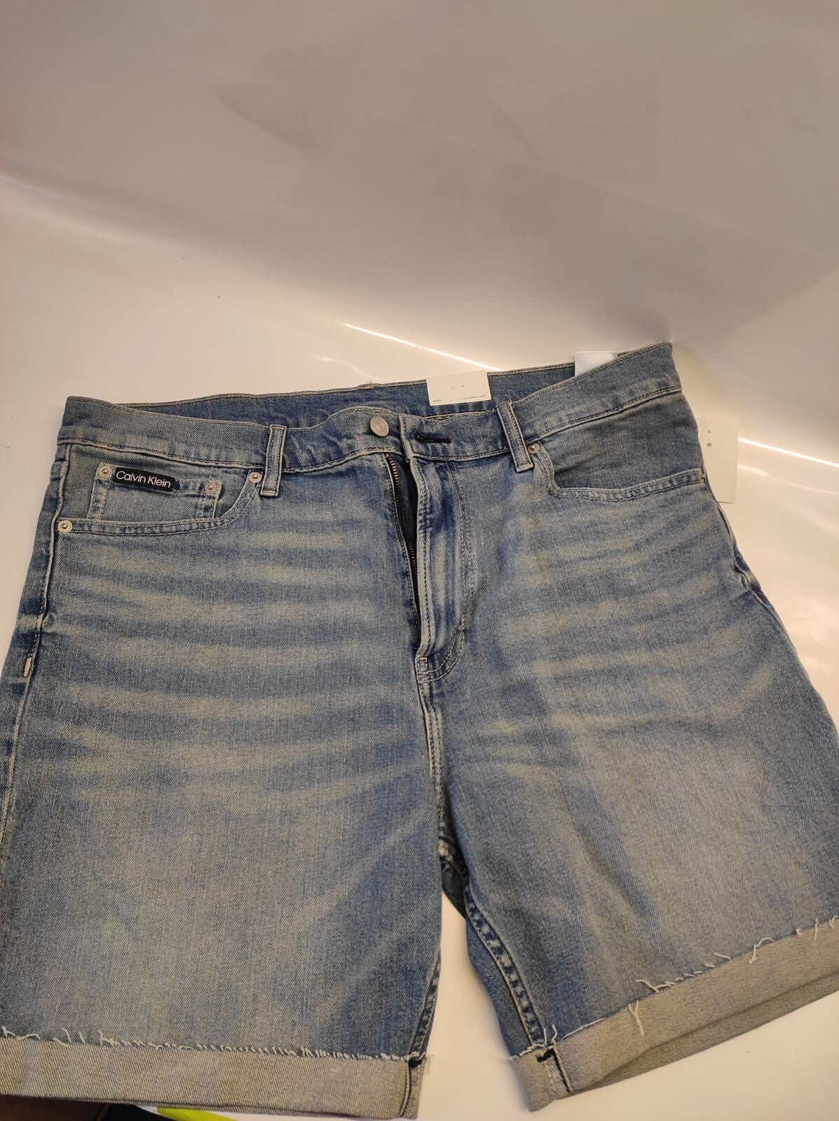 Calvin Klein Mens 36" Cut-Off Denim Shorts