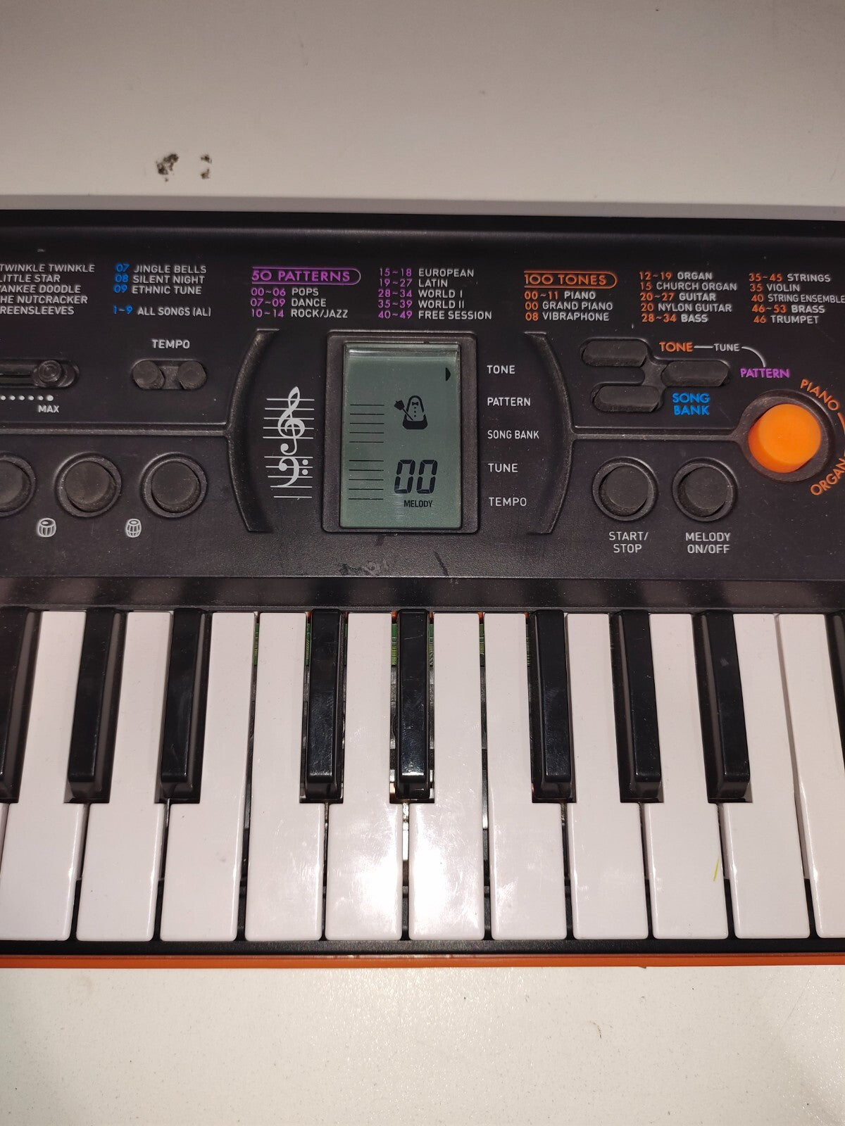 Casio SA-76 44-Key Mini Keyboard with 100 Tones 50 Rhythms Battery Powered E1
