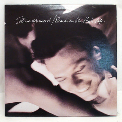 Musical Elevation: Steve Winwood 'Back in the High Life' Vinyl Album Record LP